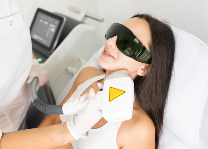 Laser hair removal for facial skin. Woman in epilation salon